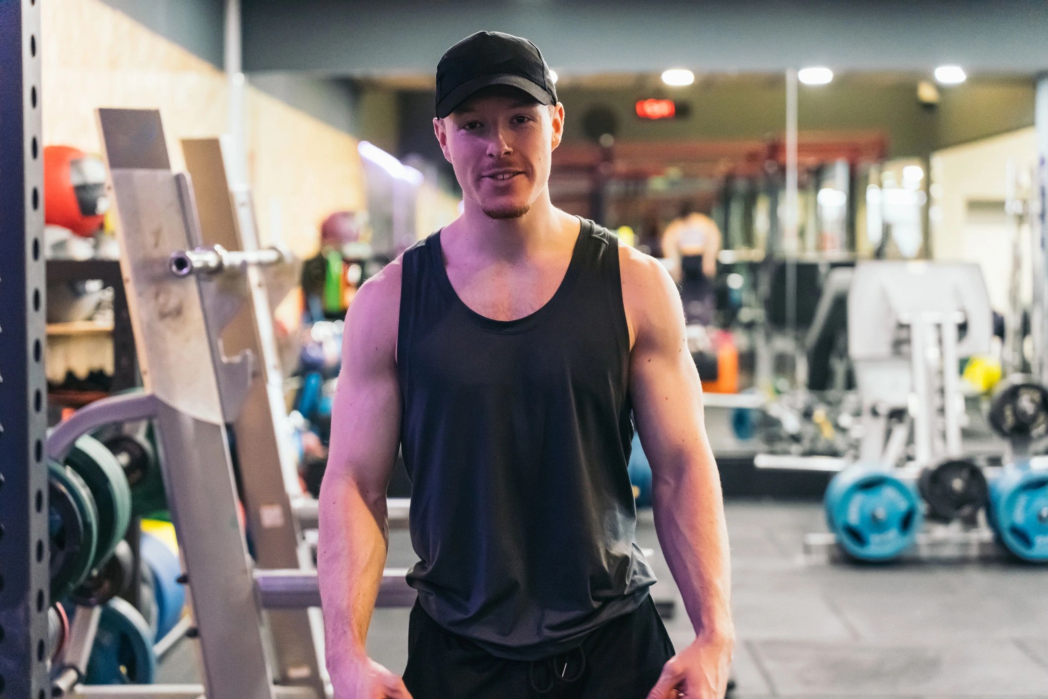 Muscular athlete in gym